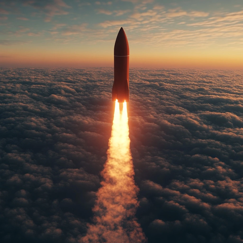 红色火箭飞向日出天空