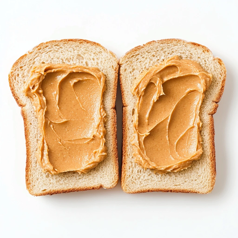 两片白面包涂抹花生酱
