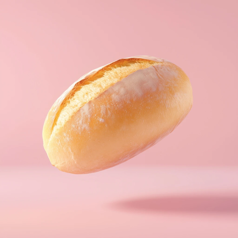 面包卷漂浮粉红背景