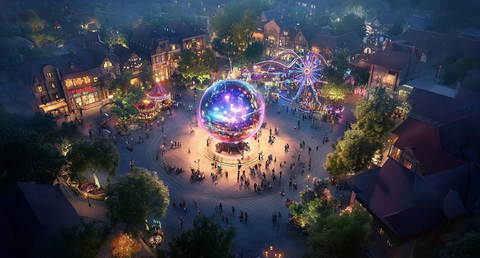 小镇夜景中的热闹广场与游乐设施