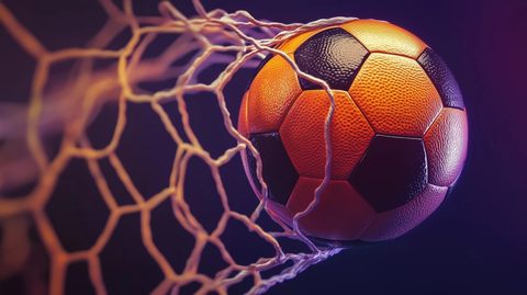 橙色足球穿过球网