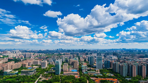 城市高楼大厦鸟瞰全景蓝天白云相衬