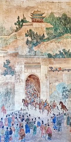 古代城门下的人群与骑马者景象