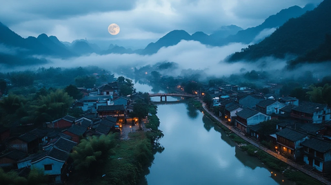 月光下云雾缭绕的山村河流夜景全景