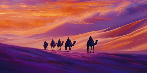 沙漠中骆驼队行走的壮丽景象