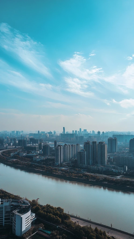 城市河流边的高楼大厦鸟瞰全景