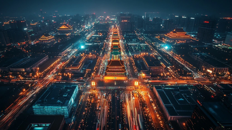 城市夜景俯瞰视角下的繁华街道与古建筑